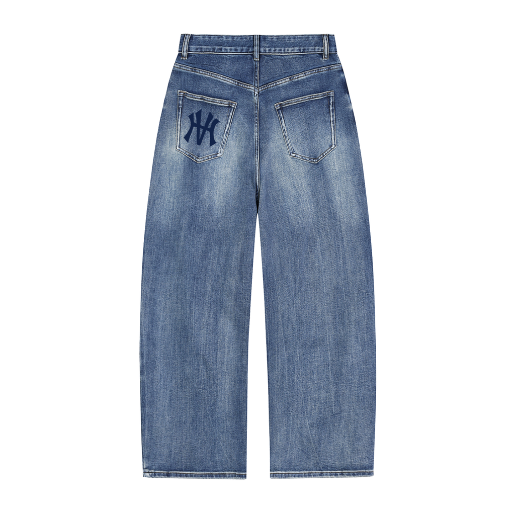 Blue jeans with a logo on the back pocket against a white background